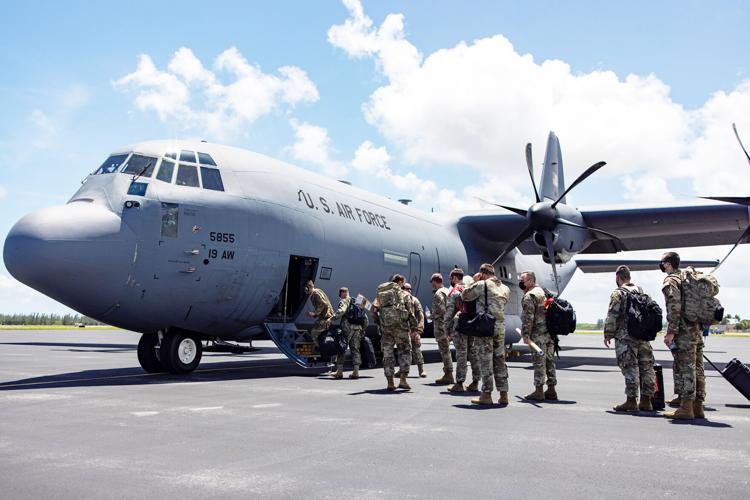 Haiti command and control element boards a C-130 aircraft from Homestead Air Reserve base to direct disaster relief operation in Haiti, Aug. 17.