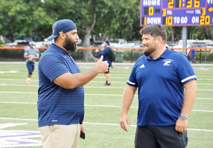 Homestead Coach Philip Simpson and Palmetto Coach Mike Manasco.