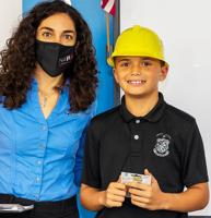 NAWIC member Kim Paez with second place student Johnathan.