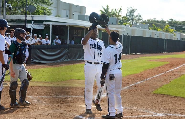 Jamar Fairweather celebrating his home run with Jayden Melendez (14)