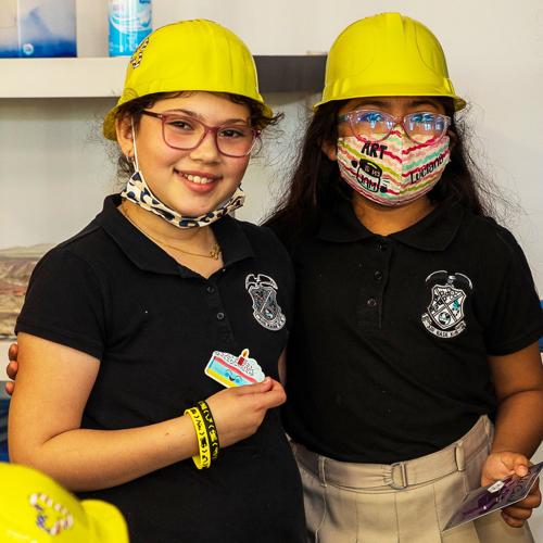 Third place tie students Caitlyn M. and Luciana.