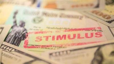 Coronavirus financial Federal STIMULUS from government USA dollar cash banknote on American flag Global pandemic Covid 19 lockdown