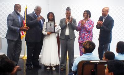 Applauding Angel are (from left)  School Youth Mentor James Hawkins, Florida City Mayor Otis Wallace, Angel Allen, Florida City  First Lady Greer Wallace, Founding Principal & Principal of Curriculum Julie Ravenall, and Principal of Discipline Donald Ra...