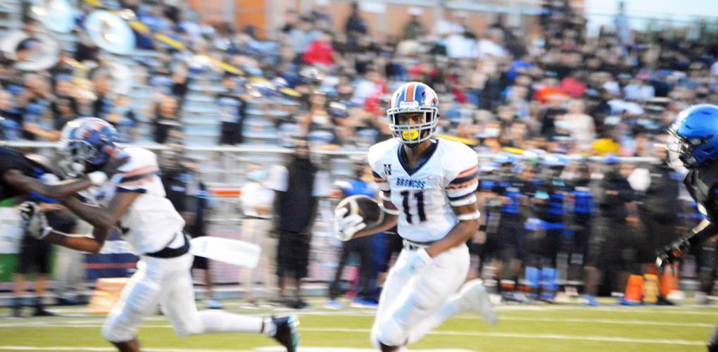 Bronco’s Da-Vonte Calexte (11) takes off.
