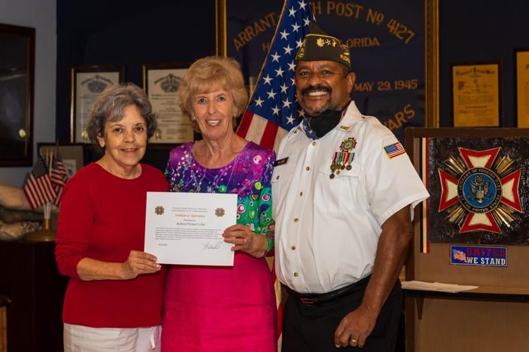Ida Gilbert  and Krystyna Grant accept for the Redland Woman’s Club.