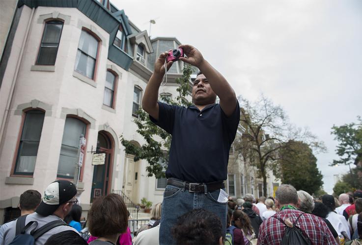 Massive lines leave people in limbo while waiting to see Pope Francis