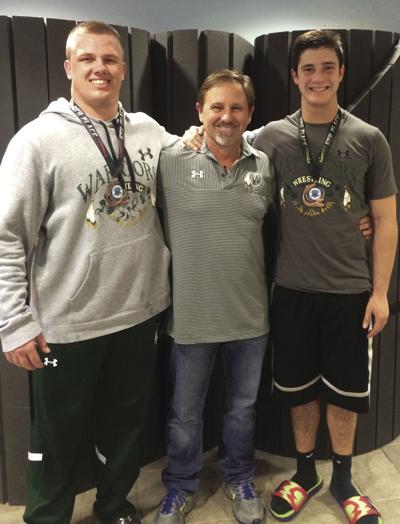 From left: Dylan Charlton, Coach Pedersen, Anthony Machado