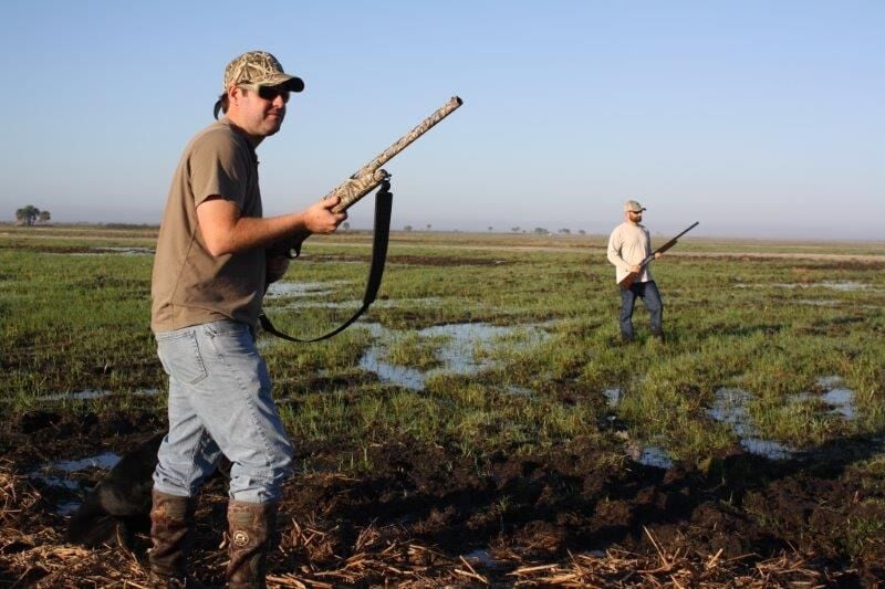 Friends enjoy snipe hunting at T.M. Goodwin Public Small Game Hunting Area.