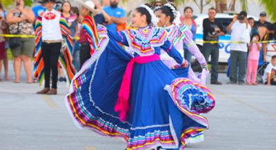 Ballet Folklorico dancers make their colorful costumes part of their performances