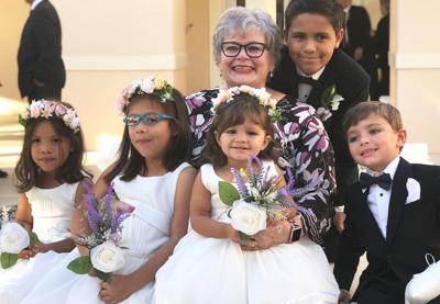 Doris and her grands, all dressed up.