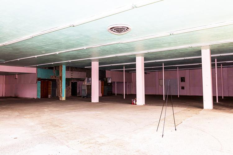 This is one of the 3 bays of the old Edison  Furniture building. The Krome Marketplace concept  envisions opening up the interior of the building to  comprise one large space.