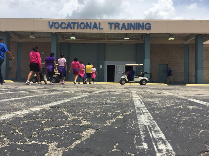 Homestead Temporary Shelter- kids into building