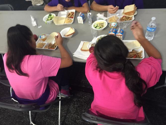 Homestead Temporary Shelter-Kids eating