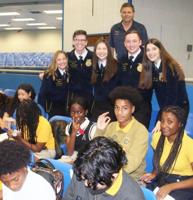 Redland Middle School learns from Future Farmers of America (FFA) officers