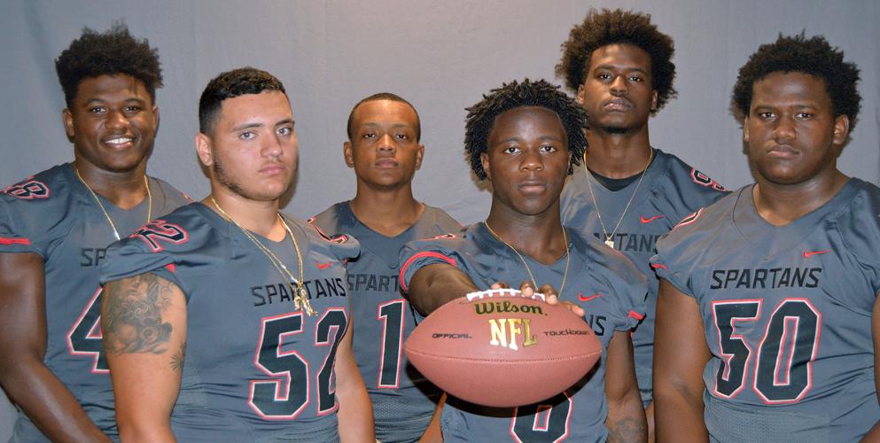 From left: Southridge’s Marvin Strong (48), Josh Torres (52), Chris McDonald (1), Courtney Reese (6 ), Diamante Howard (9), and Marcus Strong (50).