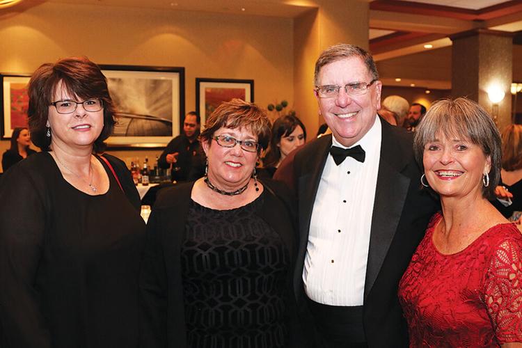 Sherry Anderson, Kim Helper, Tom and Lydia Miller attend the Legacy Ball in 2019