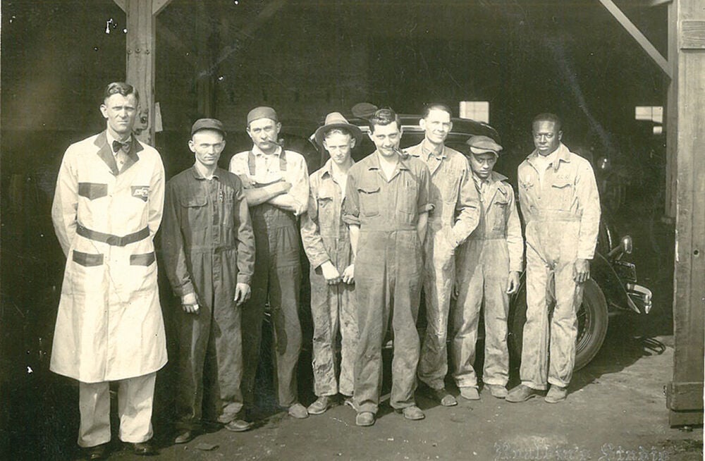Employees of Walker Chevrolet when it was located on Main Street about where Binks is now located.