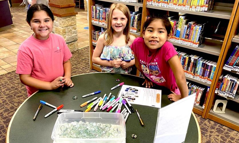 Kids at Le Sueur Library explore dragons and runes Community