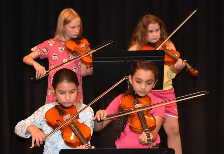 Olson's final orchestra program gives beginners first stage experience