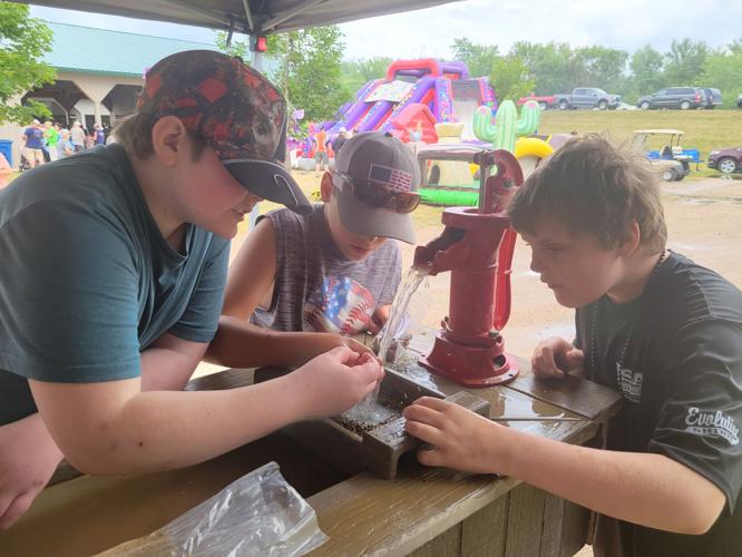 Showers fail to sour Henderson's annual Sauerkraut Days News