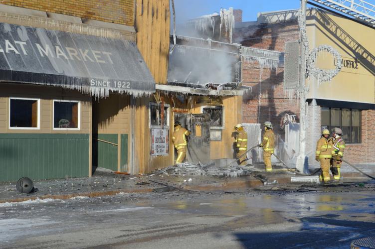 Wednesday morning fire damages two Main Street businesses in Janesville