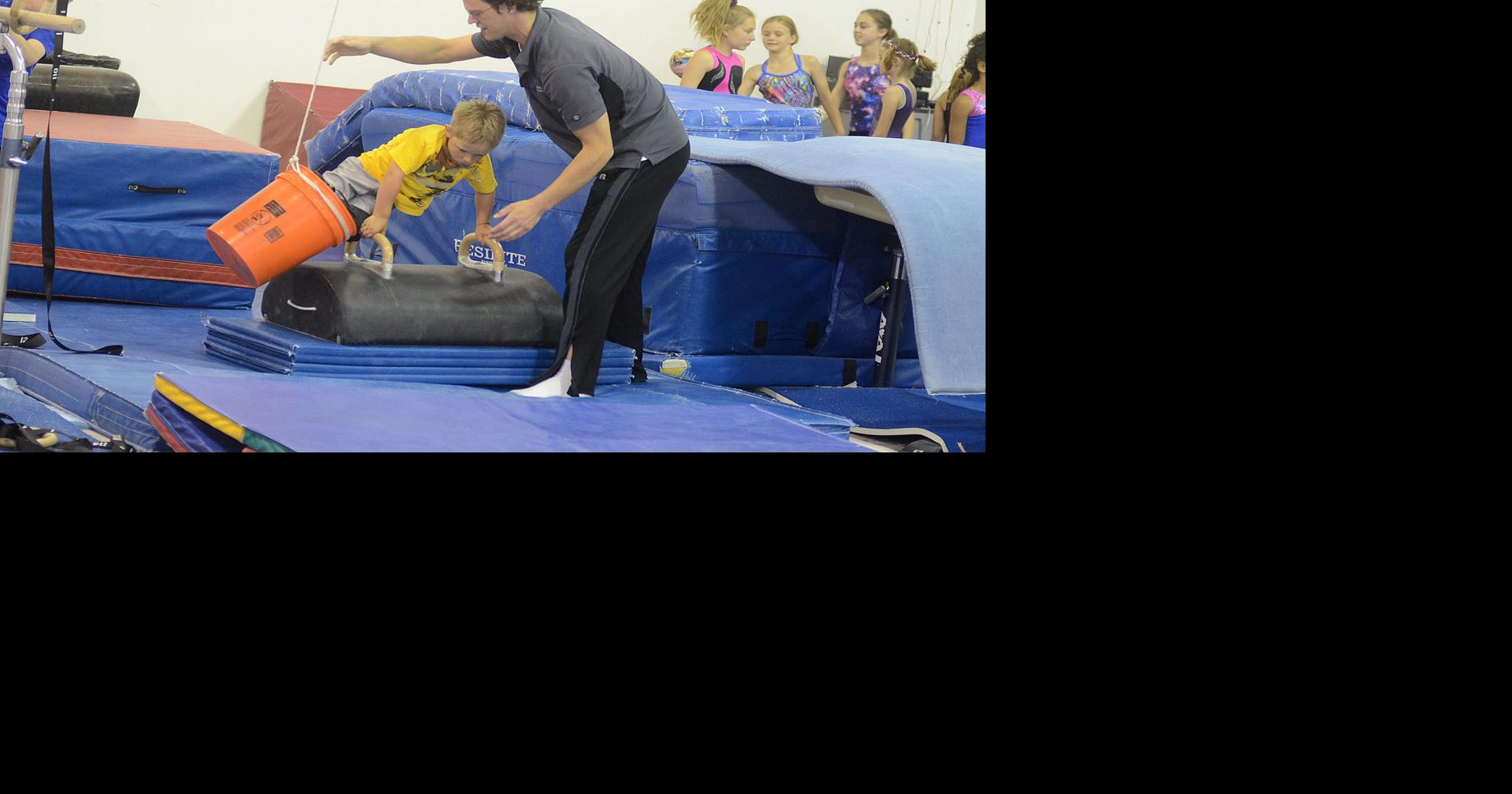 Wrestling and gymnastics meet with class at Northfield Gymnastics Club Sports