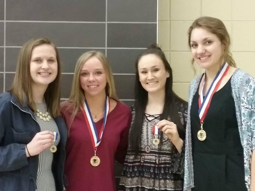 Four girls' basketball players gain conference honors