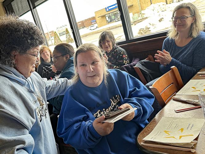 Friendship House Volunteer of the Year fell in love with felines