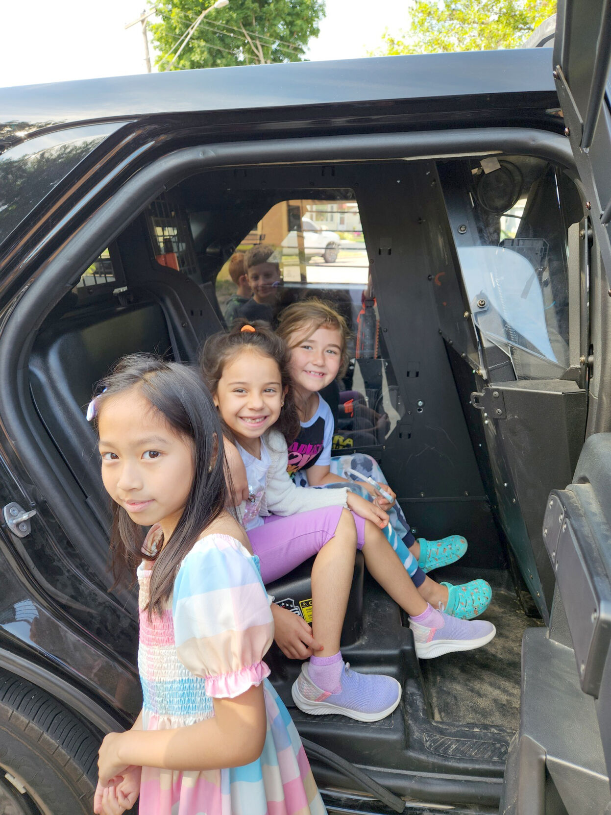 PHOTOS Police and fire departments visit STEAM Community