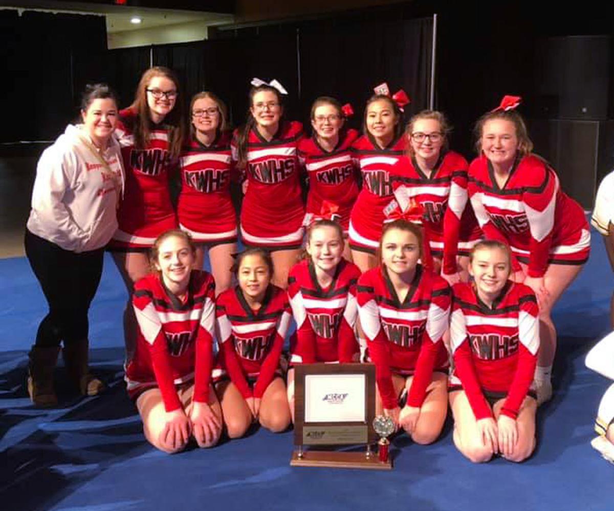 KW competition cheer team with the MCCA State trophy
