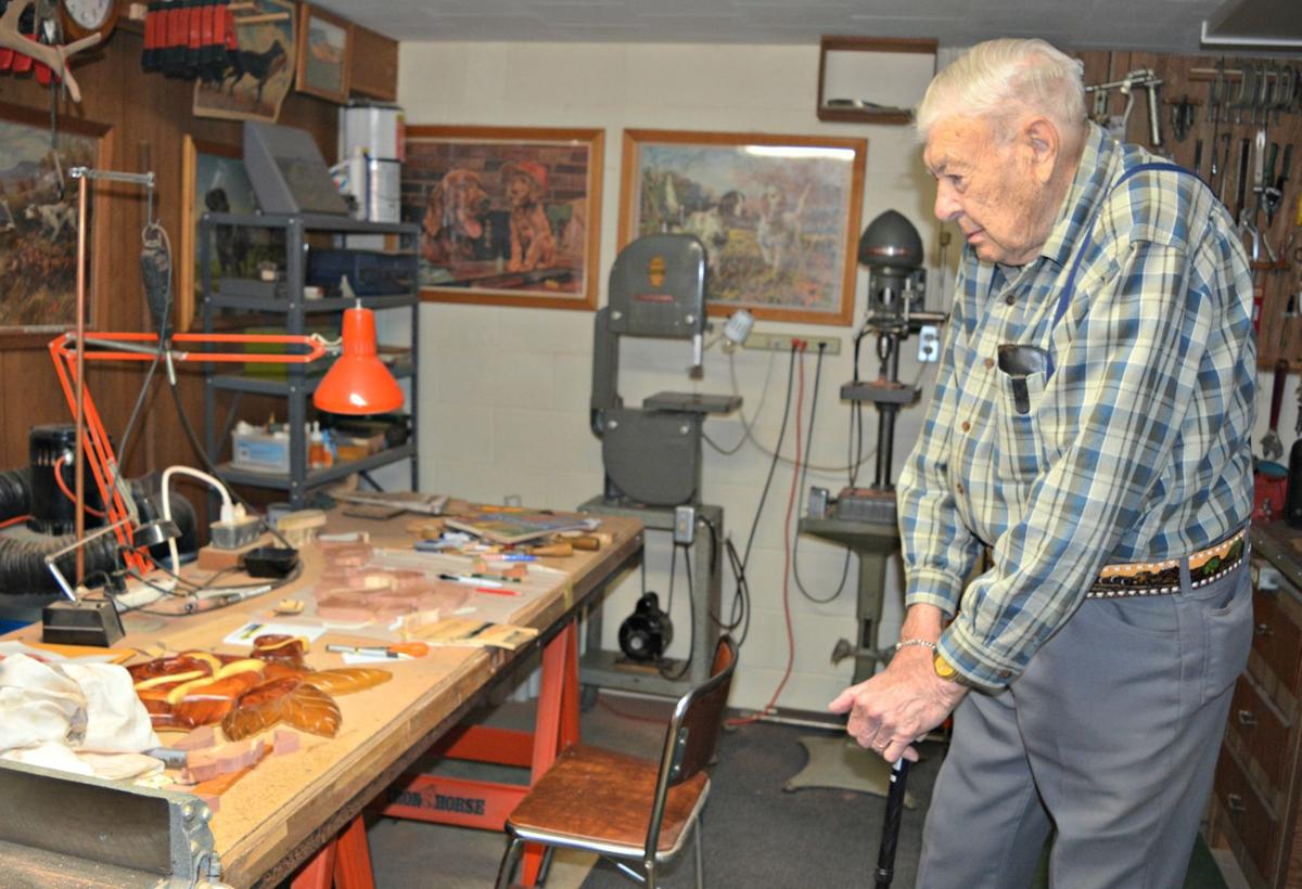 Wooden faces Le Sueur man creates intricate carvings News