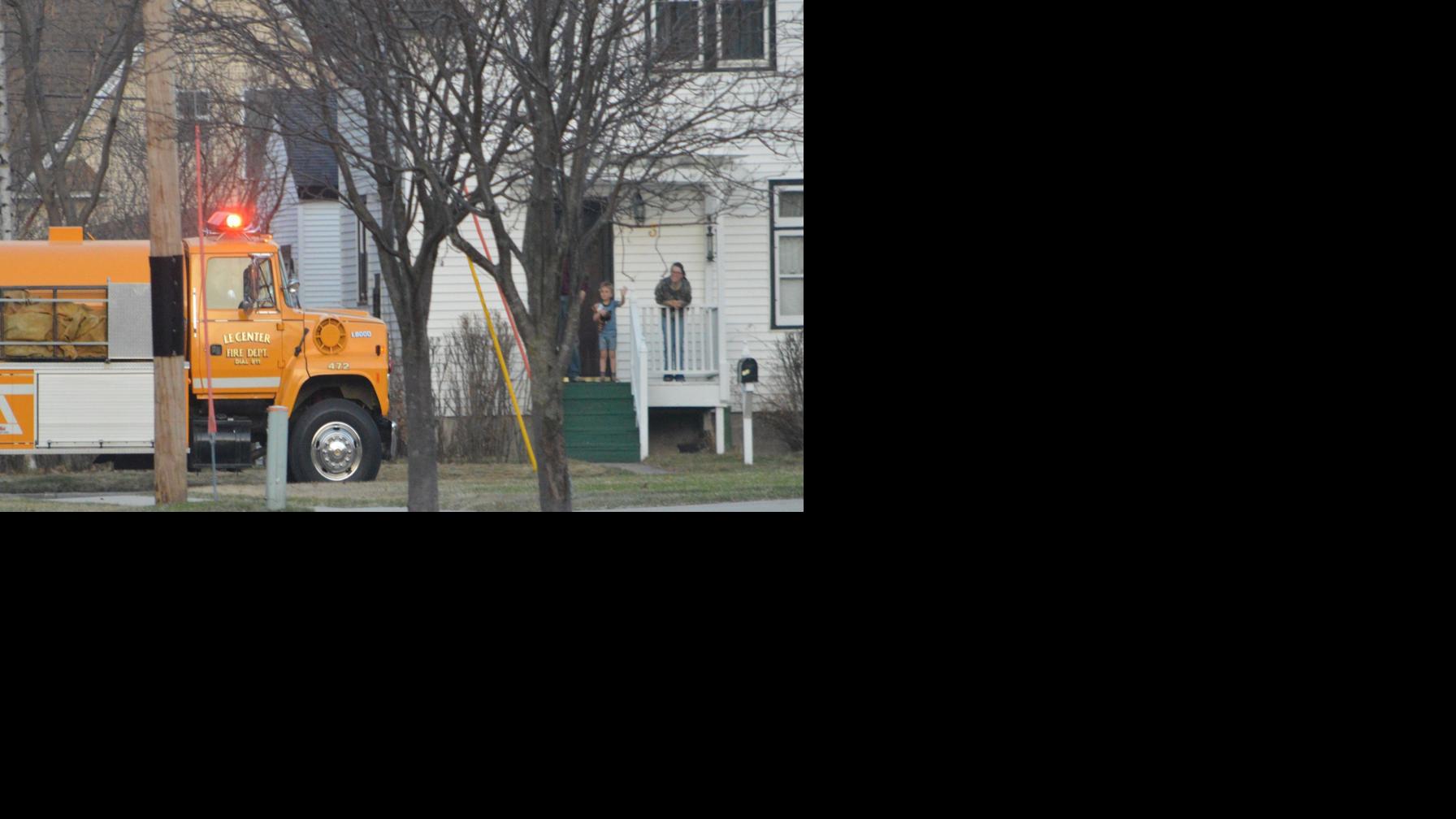 GALLERY Le Center Fire rallies community with evening parade News