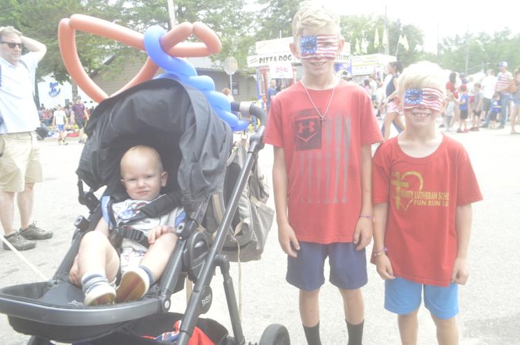 PHOTOS Hundreds flock to Elysian for flagwaving Fourth of July News