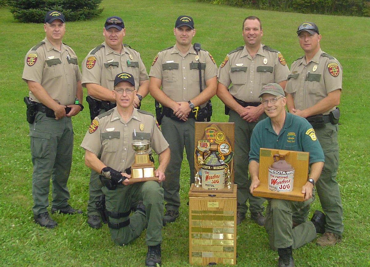 Waseca conservation officer helps snag title for DNR pistol team