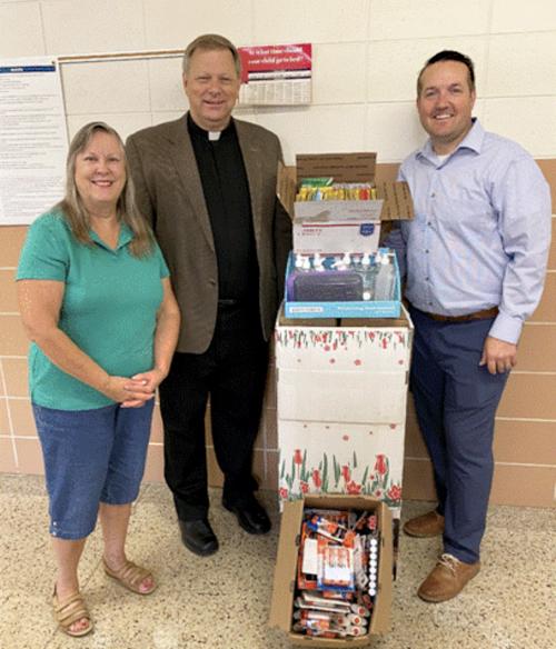 Christ the King donates to elementary school