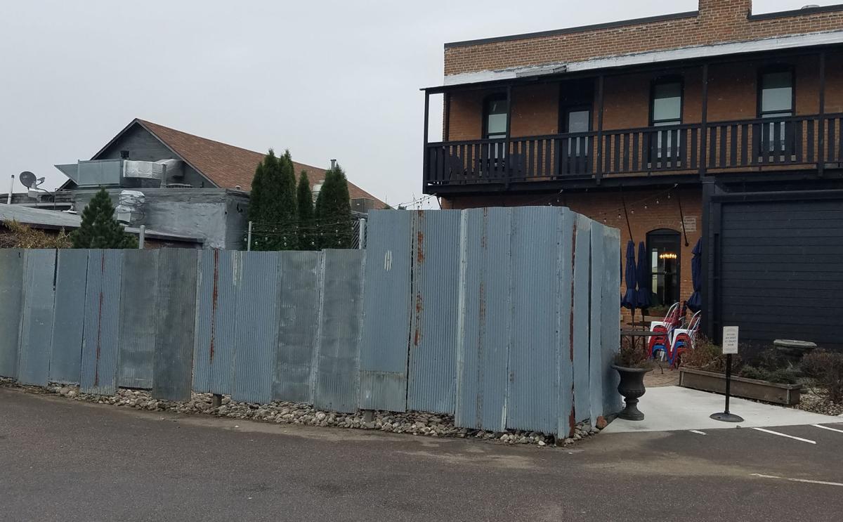 Tin Fence Around Third Street Tavern Patio Ok Ed By City News A Corrugated Tin Fence Replaced An Old Wooden Lattice Behind Third Street Tavern After Shortening It The Was Approved By City Heritage