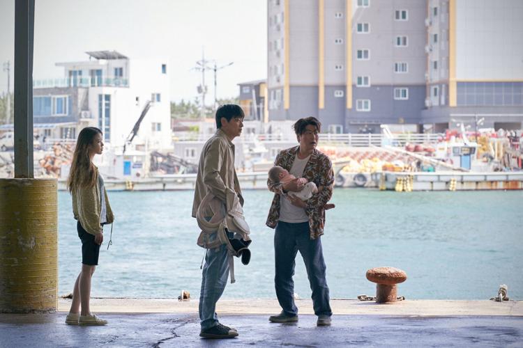 Lee Ji-eun, Gang Dong-won, and Song Kang Ho in 'Broker.' Courtesy of Neon..jpg