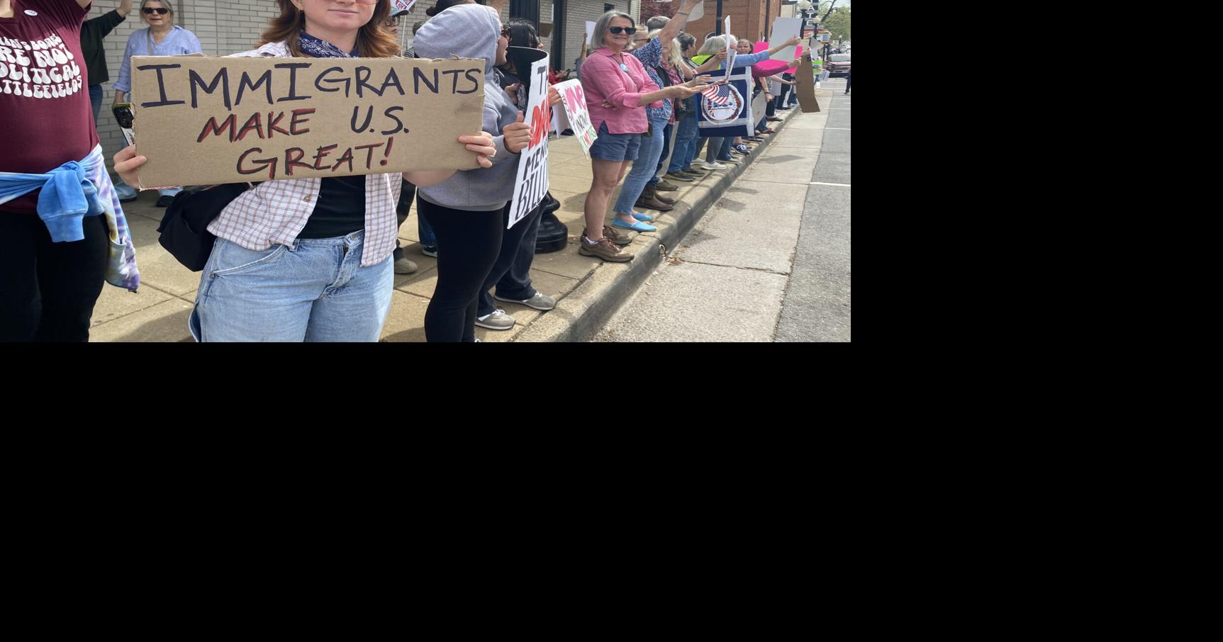 PHOTOS: Local demonstrators protest Trump administration