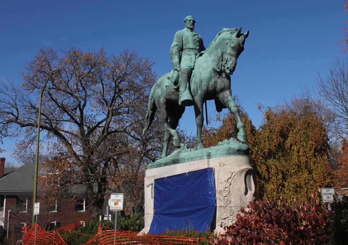 Lee statue spraypainted