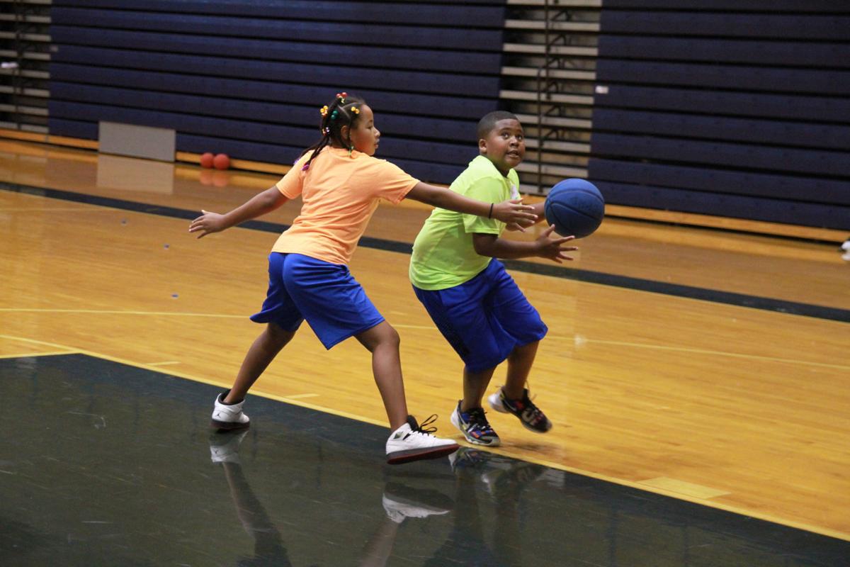 Coaches Players Chip In To Volunteer At Local Youth Basketball