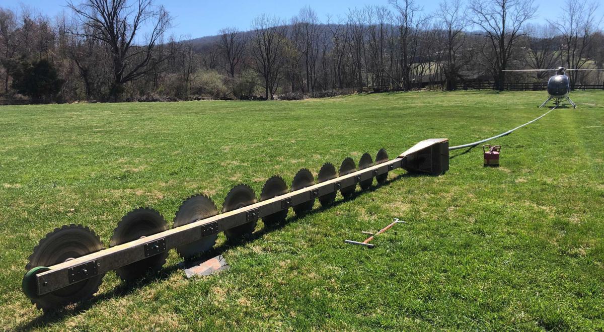 REC contracts with helicopter pilots using giant saws to cut tree limbs