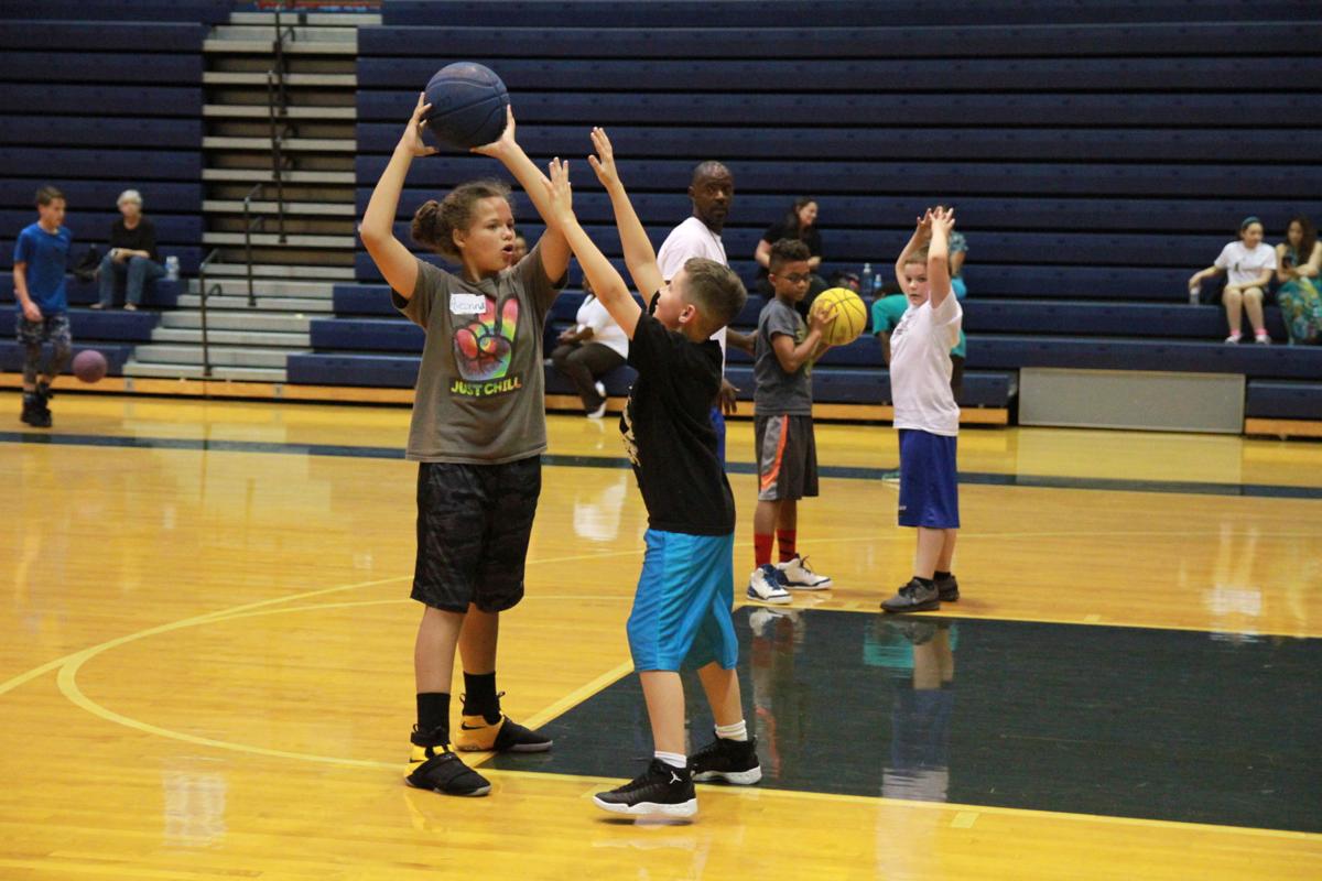 Coaches Players Chip In To Volunteer At Local Youth Basketball