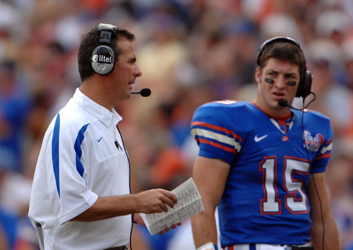 Then Gators Head Coach Urban Meyer and Tim Tebow are shown on Oct. 7, 2006 at Ben Hill Griffin Stadium in Gainesville, Florida.