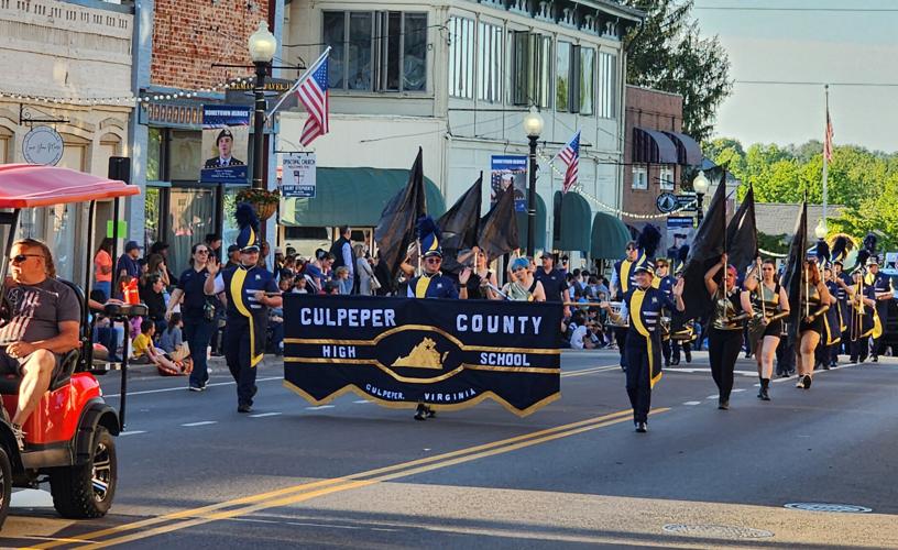 Marching on Crowds cheer return of Fireman's Parade