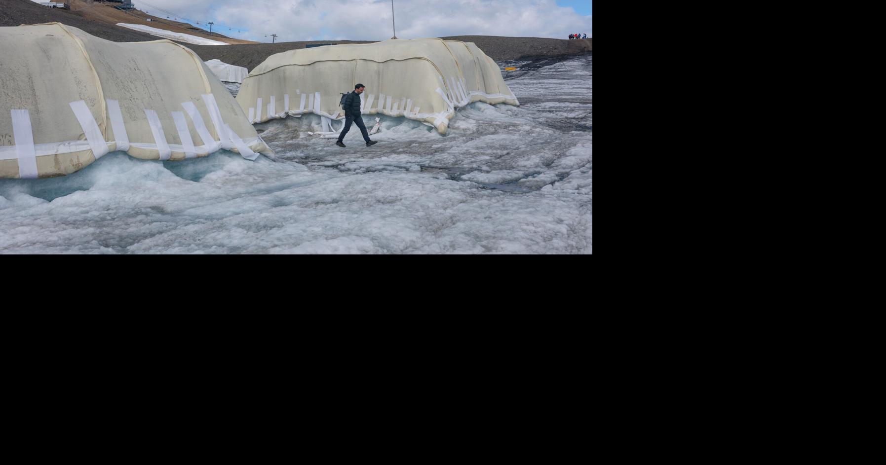 CLIMATE CHANGE Can sheep save the glaciers? Swiss scientists put wool to the test