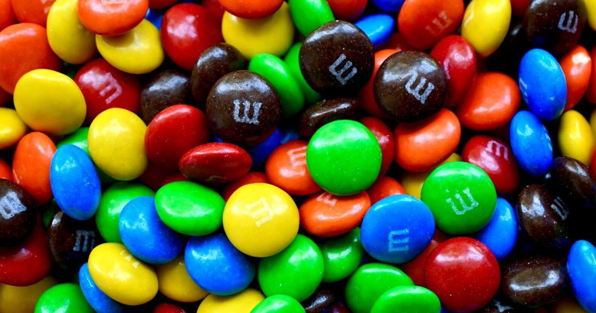 Exponents Game M&Ms is removing blue and brown from some new bags