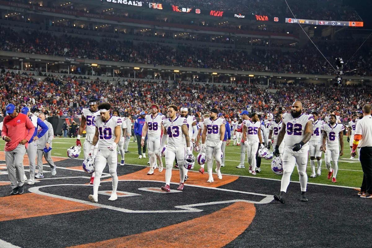 Buffalo safety Damar Hamlin collapses during game vs. Bengals, is in  critical condition, NFL says; game postponed indefinitely 