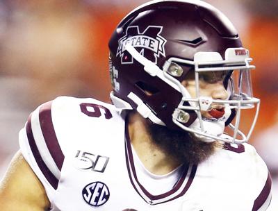 quarterback shrader starkvilledailynews scrambles