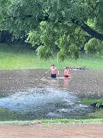 Spring Valley flooding -  kids take swim