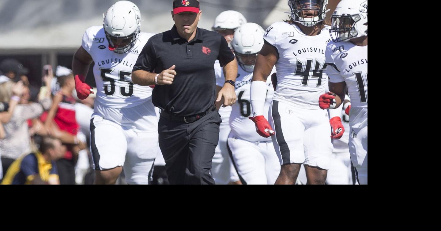 Louisville football players hold camp at King Louie's Sports Complex